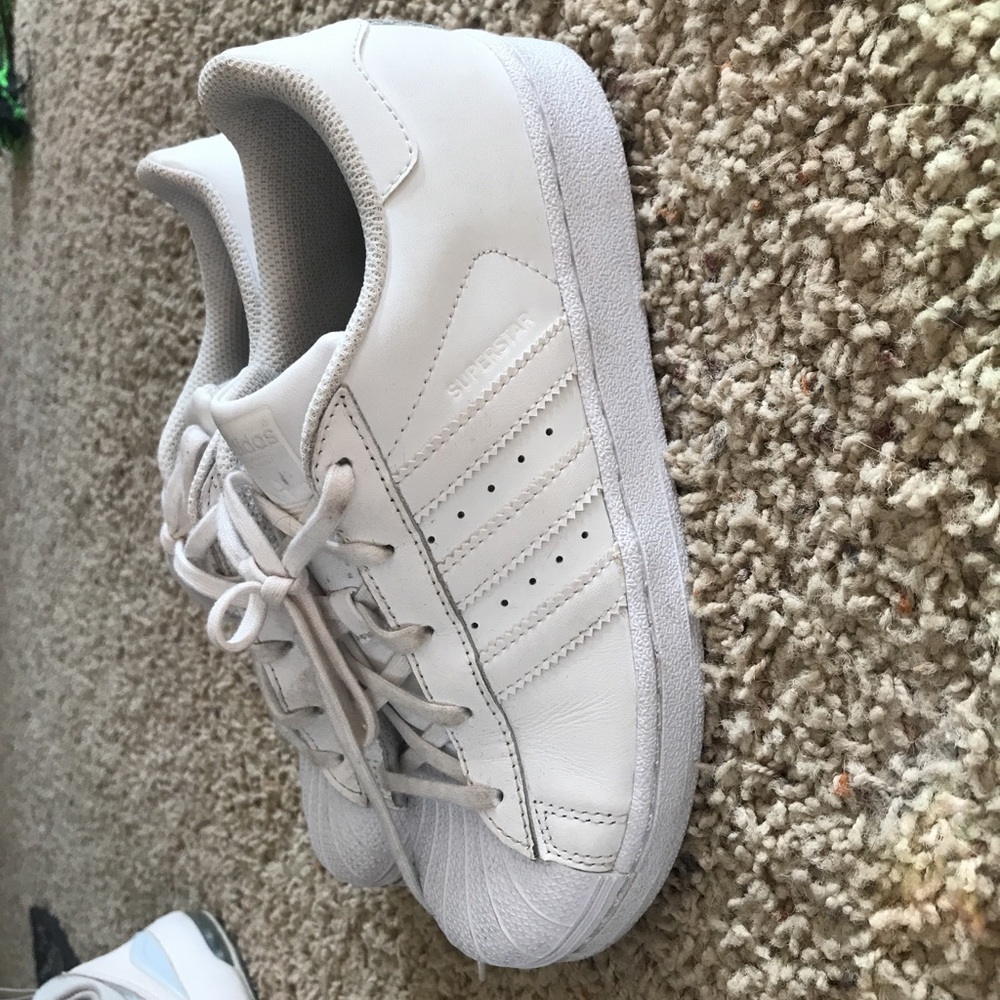 Adidas kids size 3 fits women’s size 5.5-6